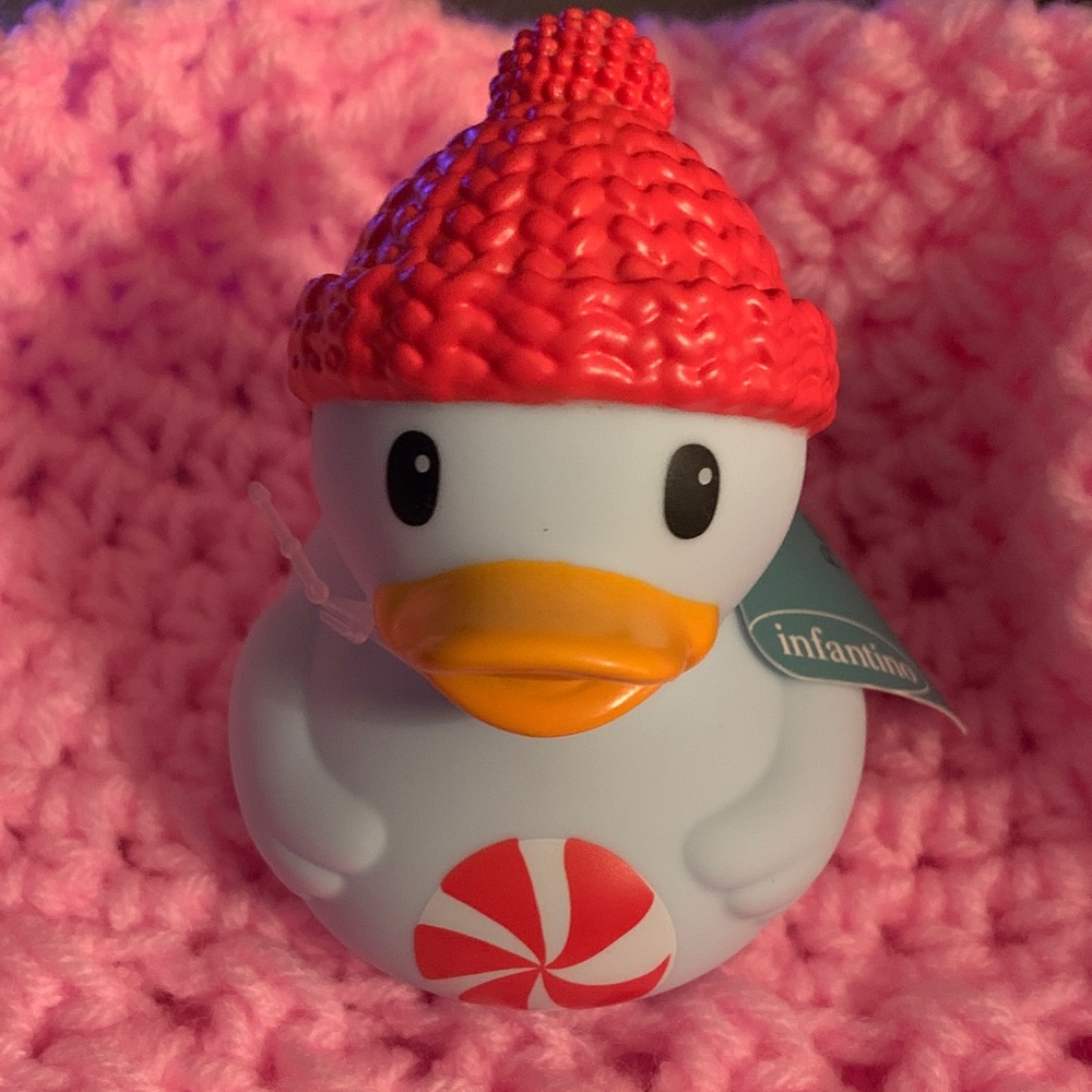 Infantino Duck with Red Knit Hat